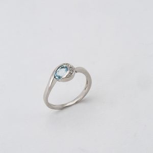 Bague "Virgule de Topaze bleue"
