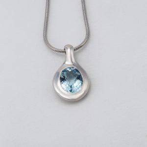 Pendentif "Galet et Topaze"